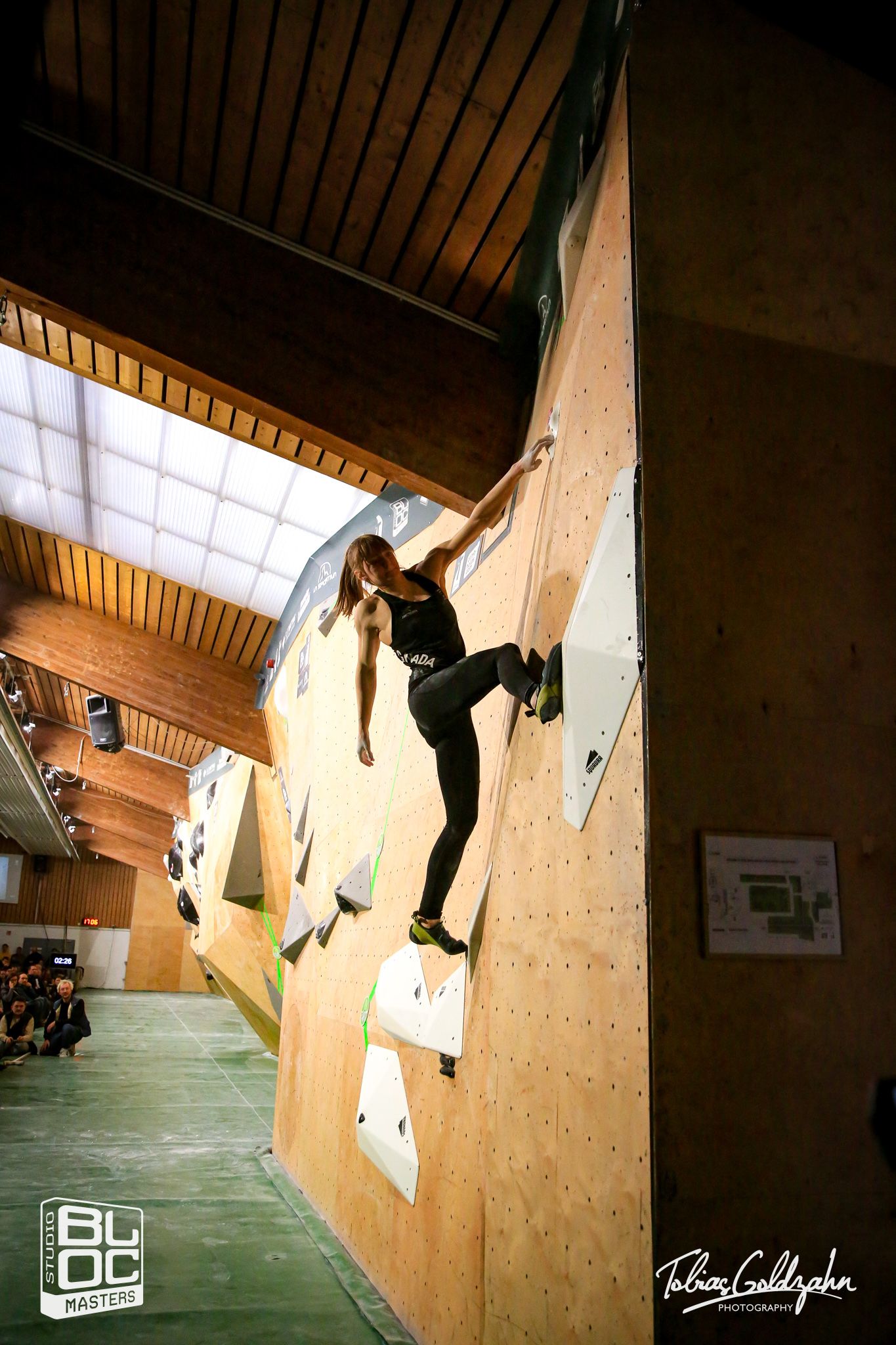 Madison Richardson climbing on her second boulder in finals of Studio Bloc Masters 2023 in Germany