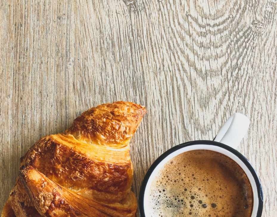 A French croissant and a coffee