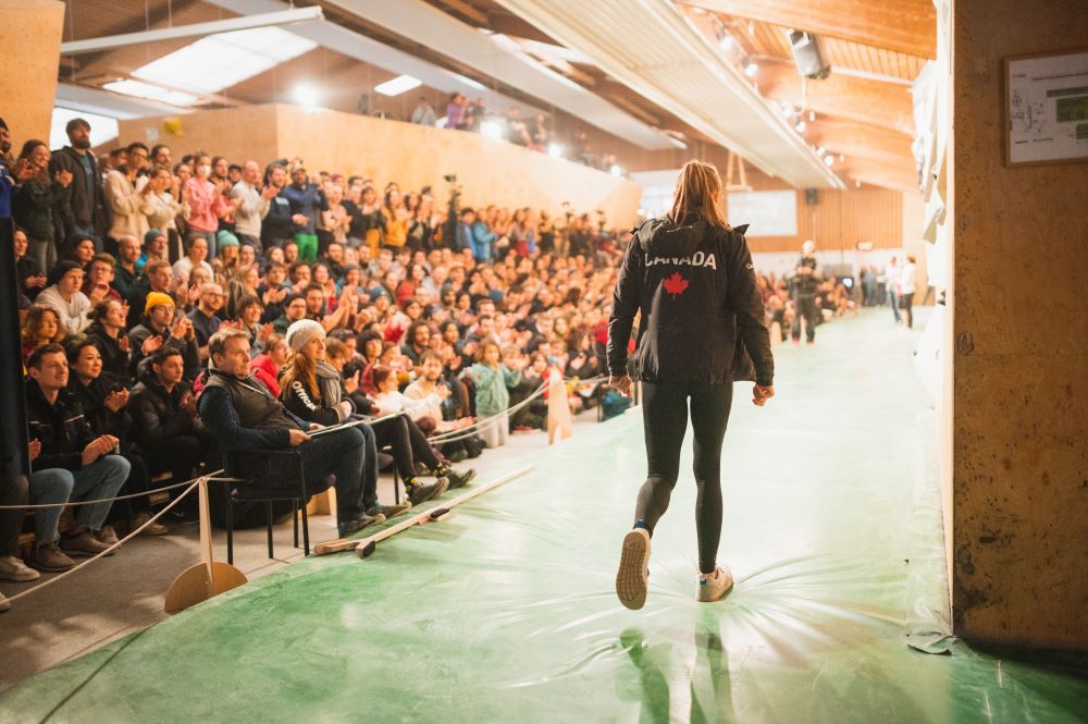 Madison Richardson walking onto the mats for finals at the 2023 Studio Bloc Masters Bouldering Competition