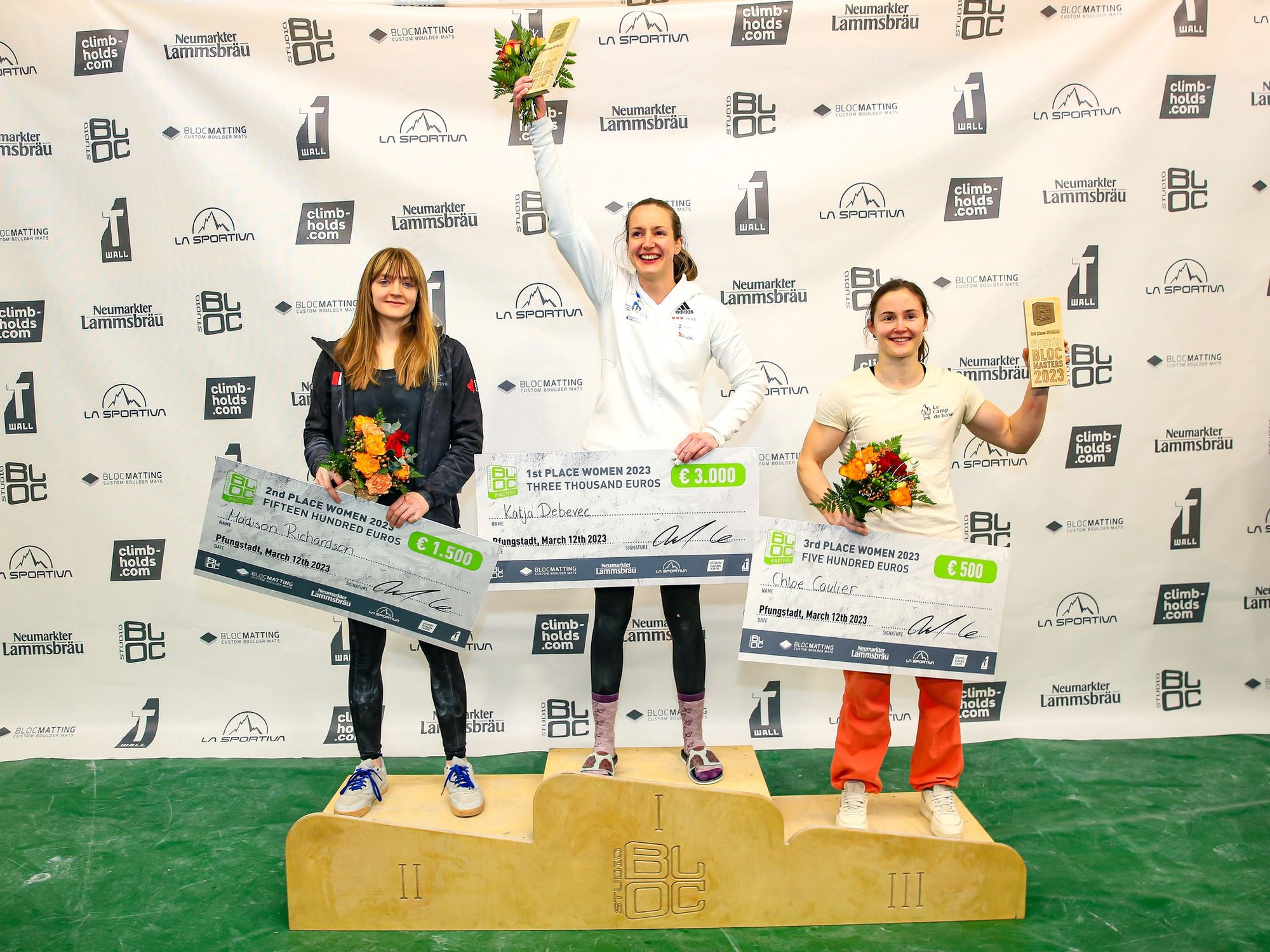 Madison Richardson, Katja Debevec, and Chloe Caulier on the podium at Studio Bloc Masters 2023 Bouldering Competition