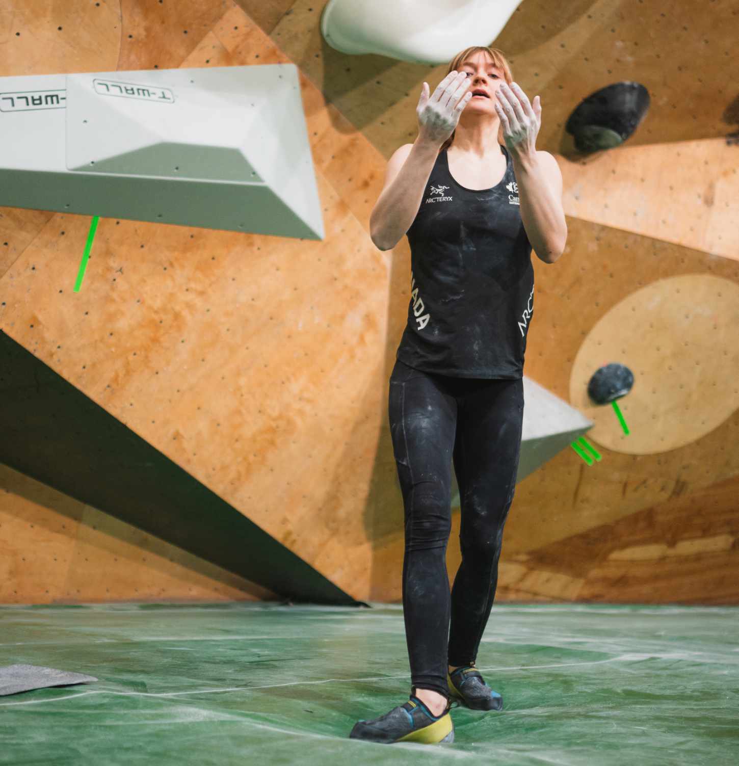 Climber looking at her hands