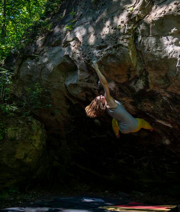 A climber bouldering at the Niagara Glen